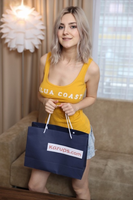 Amateur girl Eva Elfie bare her big teen tits before toying her bald pussy