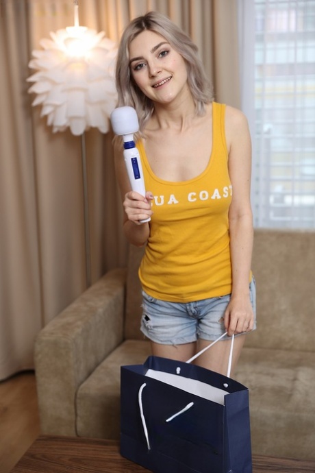 Amateur girl Eva Elfie bare her big teen tits before toying her bald pussy