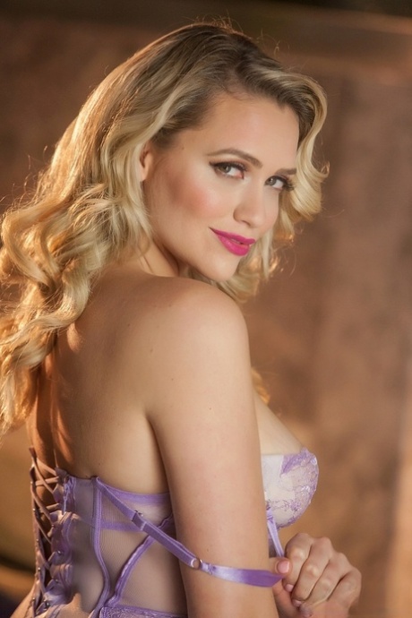 Blonde model Mia Malkova slowly removes her sexy lingerie and panty combo