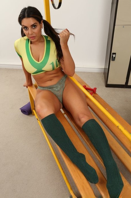 Curvy babe Charley S strips her Brazil jersey and teases with huge melons