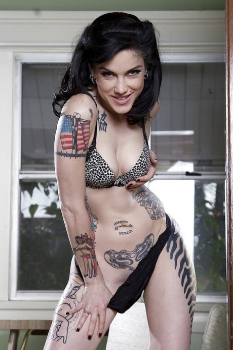 Steamy babe in knee socks Cadence St John uncovering her tattooed curves