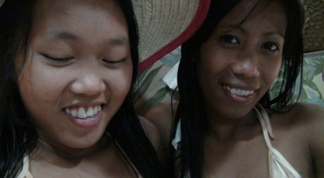 Petite Filipina girls Jeremay and Mayka share a cock in POV FFM threesome