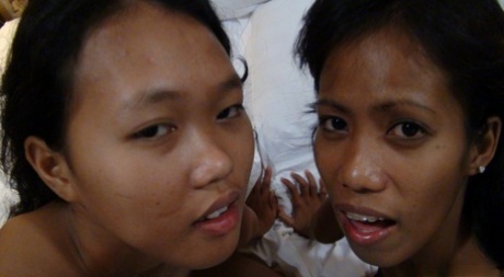 Petite Filipina girls Jeremay and Mayka share a cock in POV FFM threesome