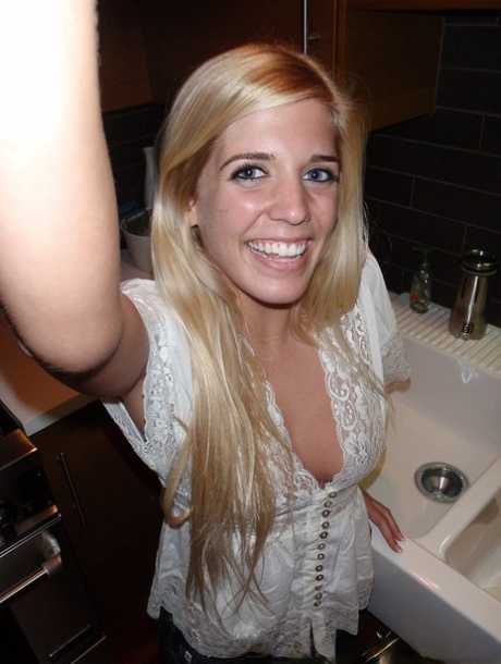 Young blonde girl takes nude and semi-nude selfies during solo action