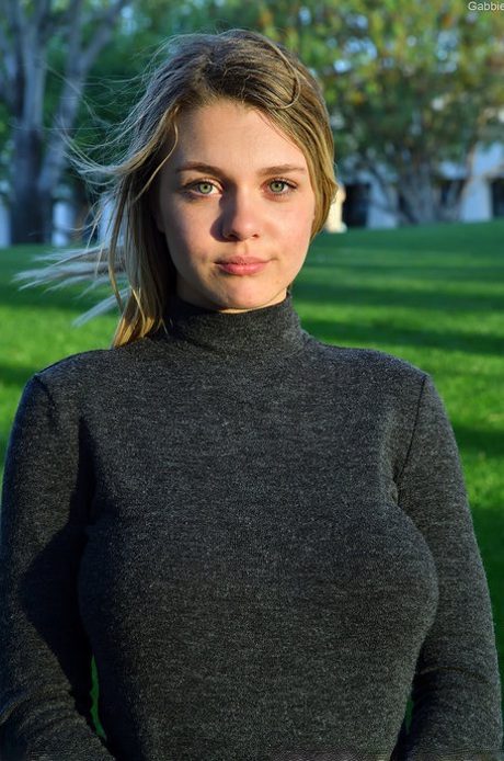 Amateur stunner Gabbie Carter revealing her huge natural boobs poolside