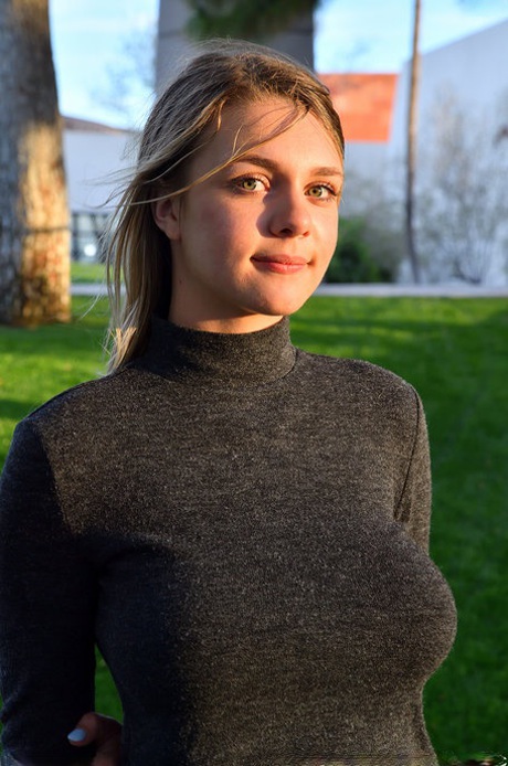 Amateur stunner Gabbie Carter revealing her huge natural boobs poolside