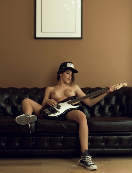 Tattooed chick Elena Petkova strikes hot solo poses for Playboy